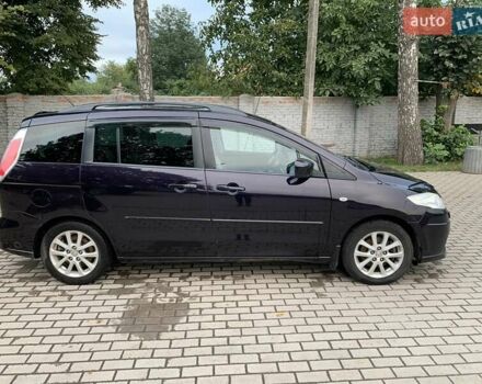 Фиолетовый Мазда 5, объемом двигателя 2 л и пробегом 179 тыс. км за 6400 $, фото 1 на Automoto.ua