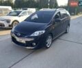 Фіолетовий Мазда 5, об'ємом двигуна 2 л та пробігом 207 тис. км за 7700 $, фото 1 на Automoto.ua
