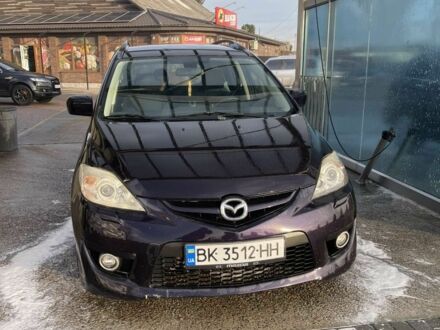 Фіолетовий Мазда 5, об'ємом двигуна 2 л та пробігом 325 тис. км за 7000 $, фото 1 на Automoto.ua