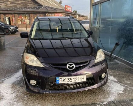 Фиолетовый Мазда 5, объемом двигателя 2 л и пробегом 325 тыс. км за 7000 $, фото 1 на Automoto.ua
