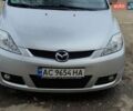 Коричневый Мазда 5, объемом двигателя 2 л и пробегом 256 тыс. км за 4200 $, фото 1 на Automoto.ua