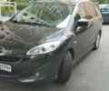 Коричневый Мазда 5, объемом двигателя 2 л и пробегом 156 тыс. км за 4500 $, фото 1 на Automoto.ua