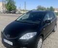 Коричневый Мазда 5, объемом двигателя 2 л и пробегом 309 тыс. км за 3500 $, фото 1 на Automoto.ua