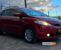 Красный Мазда 5, объемом двигателя 2 л и пробегом 287 тыс. км за 4999 $, фото 1 на Automoto.ua