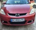 Красный Мазда 5, объемом двигателя 1.8 л и пробегом 267 тыс. км за 4200 $, фото 1 на Automoto.ua