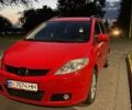 Красный Мазда 5, объемом двигателя 2 л и пробегом 320 тыс. км за 3900 $, фото 1 на Automoto.ua