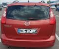 Красный Мазда 5, объемом двигателя 1.8 л и пробегом 257 тыс. км за 4158 $, фото 1 на Automoto.ua