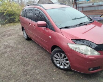 Красный Мазда 5, объемом двигателя 2 л и пробегом 210 тыс. км за 6500 $, фото 1 на Automoto.ua