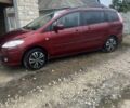 Красный Мазда 5, объемом двигателя 1.8 л и пробегом 170 тыс. км за 6000 $, фото 1 на Automoto.ua