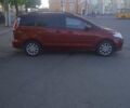 Червоний Мазда 5, об'ємом двигуна 2 л та пробігом 340 тис. км за 6200 $, фото 1 на Automoto.ua