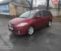 Красный Мазда 5, объемом двигателя 2 л и пробегом 220 тыс. км за 6800 $, фото 1 на Automoto.ua