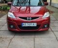 Красный Мазда 5, объемом двигателя 2 л и пробегом 214 тыс. км за 5800 $, фото 1 на Automoto.ua