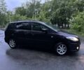 Красный Мазда 5, объемом двигателя 1.8 л и пробегом 250 тыс. км за 5700 $, фото 1 на Automoto.ua