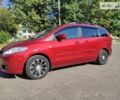 Красный Мазда 5, объемом двигателя 2 л и пробегом 267 тыс. км за 7150 $, фото 1 на Automoto.ua