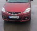 Красный Мазда 5, объемом двигателя 2 л и пробегом 158 тыс. км за 7200 $, фото 1 на Automoto.ua