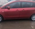 Красный Мазда 5, объемом двигателя 2 л и пробегом 158 тыс. км за 7200 $, фото 1 на Automoto.ua