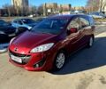 Красный Мазда 5, объемом двигателя 2 л и пробегом 270 тыс. км за 8200 $, фото 1 на Automoto.ua