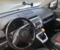 Красный Мазда 5, объемом двигателя 2 л и пробегом 297 тыс. км за 4500 $, фото 1 на Automoto.ua