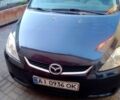 Серый Мазда 5, объемом двигателя 2 л и пробегом 350 тыс. км за 4200 $, фото 1 на Automoto.ua