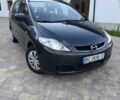 Сірий Мазда 5, об'ємом двигуна 2 л та пробігом 337 тис. км за 4700 $, фото 4 на Automoto.ua