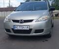 Серый Мазда 5, объемом двигателя 1.8 л и пробегом 200 тыс. км за 4023 $, фото 1 на Automoto.ua