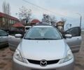 Серый Мазда 5, объемом двигателя 2 л и пробегом 335 тыс. км за 5200 $, фото 1 на Automoto.ua