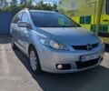 Серый Мазда 5, объемом двигателя 2 л и пробегом 239 тыс. км за 6000 $, фото 1 на Automoto.ua