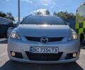 Серый Мазда 5, объемом двигателя 2 л и пробегом 239 тыс. км за 6000 $, фото 1 на Automoto.ua