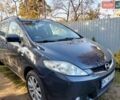 Серый Мазда 5, объемом двигателя 2 л и пробегом 240 тыс. км за 4650 $, фото 1 на Automoto.ua