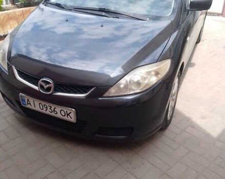 Серый Мазда 5, объемом двигателя 2 л и пробегом 354 тыс. км за 4200 $, фото 1 на Automoto.ua