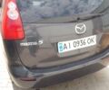 Серый Мазда 5, объемом двигателя 2 л и пробегом 354 тыс. км за 4200 $, фото 1 на Automoto.ua
