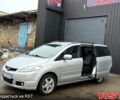 Серый Мазда 5, объемом двигателя 2 л и пробегом 1670 тыс. км за 4950 $, фото 2 на Automoto.ua