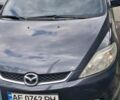 Серый Мазда 5, объемом двигателя 2 л и пробегом 260 тыс. км за 5000 $, фото 1 на Automoto.ua