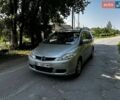 Серый Мазда 5, объемом двигателя 1.8 л и пробегом 321 тыс. км за 4508 $, фото 1 на Automoto.ua