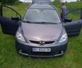Серый Мазда 5, объемом двигателя 2 л и пробегом 175 тыс. км за 5500 $, фото 1 на Automoto.ua