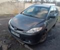 Серый Мазда 5, объемом двигателя 2 л и пробегом 250 тыс. км за 5000 $, фото 1 на Automoto.ua