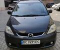 Серый Мазда 5, объемом двигателя 2 л и пробегом 178 тыс. км за 5000 $, фото 1 на Automoto.ua
