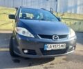 Серый Мазда 5, объемом двигателя 2 л и пробегом 343 тыс. км за 4600 $, фото 1 на Automoto.ua