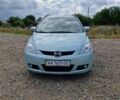 Серый Мазда 5, объемом двигателя 2 л и пробегом 213 тыс. км за 5268 $, фото 1 на Automoto.ua