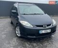Серый Мазда 5, объемом двигателя 2 л и пробегом 279 тыс. км за 6000 $, фото 1 на Automoto.ua