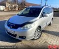 Серый Мазда 5, объемом двигателя 2 л и пробегом 350 тыс. км за 5500 $, фото 1 на Automoto.ua