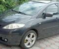 Сірий Мазда 5, об'ємом двигуна 2 л та пробігом 250 тис. км за 3601 $, фото 1 на Automoto.ua