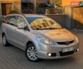 Серый Мазда 5, объемом двигателя 1.8 л и пробегом 236 тыс. км за 5499 $, фото 1 на Automoto.ua