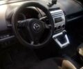 Серый Мазда 5, объемом двигателя 2 л и пробегом 366 тыс. км за 4500 $, фото 1 на Automoto.ua