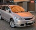 Серый Мазда 5, объемом двигателя 1.8 л и пробегом 236 тыс. км за 5499 $, фото 1 на Automoto.ua