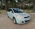 Серый Мазда 5, объемом двигателя 2 л и пробегом 214 тыс. км за 4999 $, фото 1 на Automoto.ua