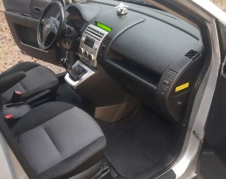 Серый Мазда 5, объемом двигателя 1.8 л и пробегом 287 тыс. км за 5600 $, фото 6 на Automoto.ua