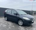 Серый Мазда 5, объемом двигателя 2 л и пробегом 279 тыс. км за 3900 $, фото 1 на Automoto.ua