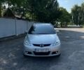 Серый Мазда 5, объемом двигателя 2 л и пробегом 290 тыс. км за 3999 $, фото 1 на Automoto.ua