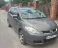 Серый Мазда 5, объемом двигателя 2 л и пробегом 206 тыс. км за 3800 $, фото 1 на Automoto.ua